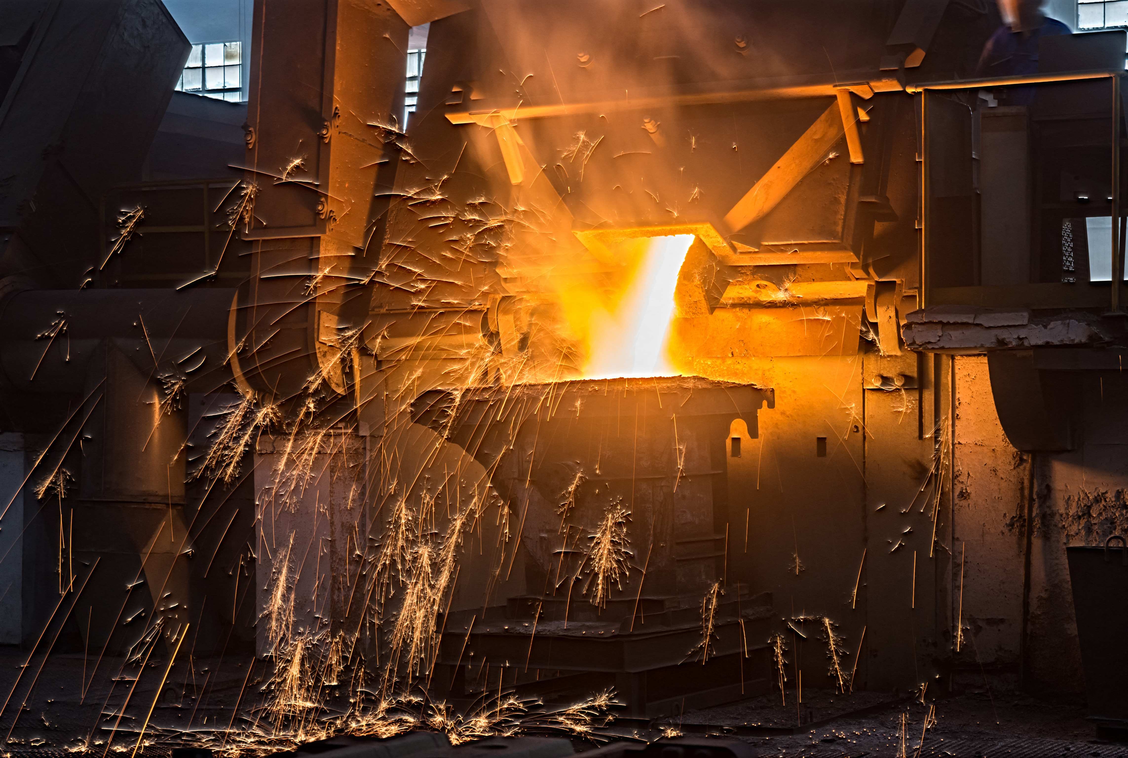 Confidential — Steel Fabricator — Twin-arm structural welding cell — 2.4× deposition rate to AWS D1.1